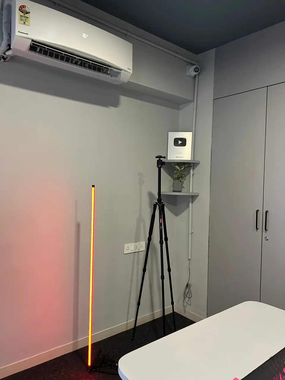 Tripod set up for vertical video in the studio